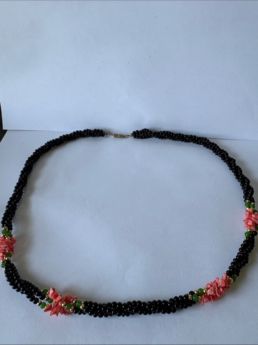 Handmade Black Beaded Necklace with Pink Flower Accents